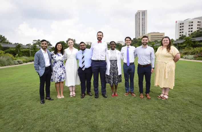 2024-2025 MDA track interns with site director Dr. Odaro, chief residents Kevin Milligan and Faheem Bilal, and administrative leader Charity Sembera