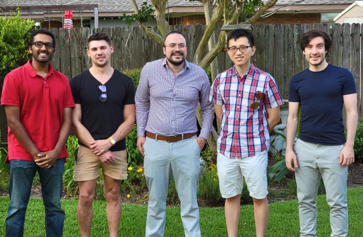 people smiling outside