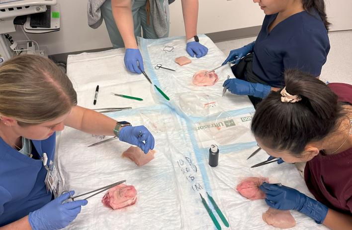 OB/GYN residents performing a minor surgery simulation
