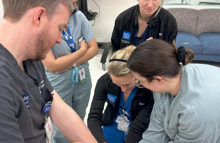 OB/GYN residents performing a mock birth