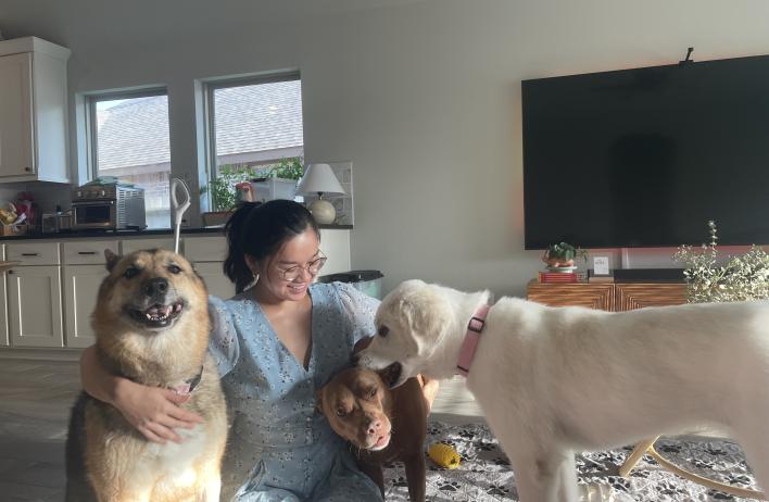 a woman with two pets