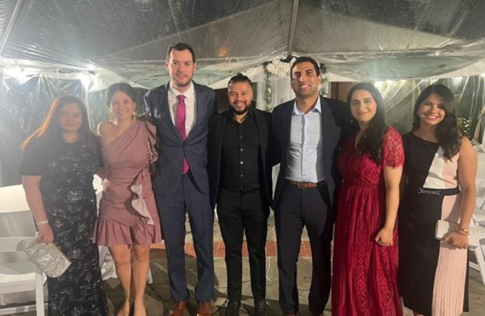 group of people dressed nicely, smiling