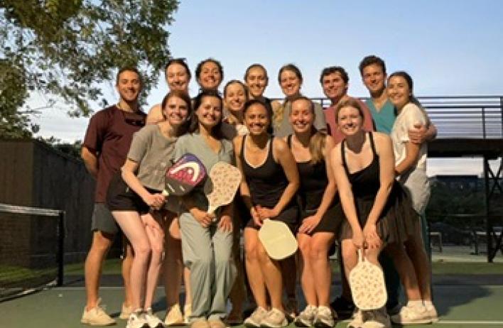 The residents play pickleball as part of their wellness activities.