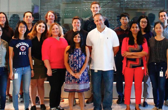 Deneen Lab Members 2017 posing in rows, smiling