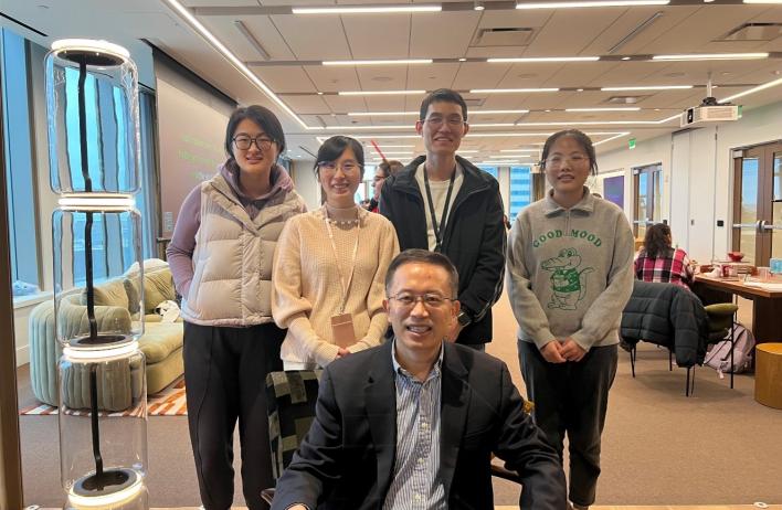 members of lab smiling together