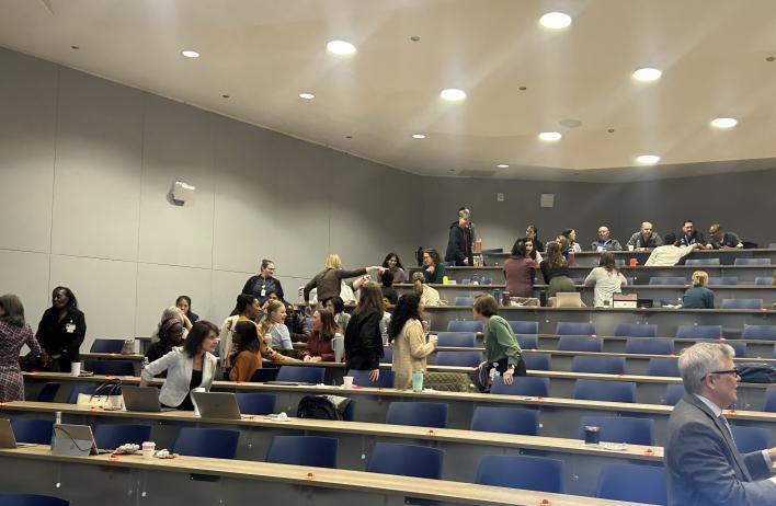 The faculty participating in their group breakout session.