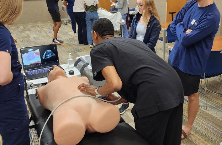 MS 1 students attend a POCUS workshop held at both campuses during EGGS to scan the abdomen and pelvis on physical exam standardized patients and our high-fidelity simulator.