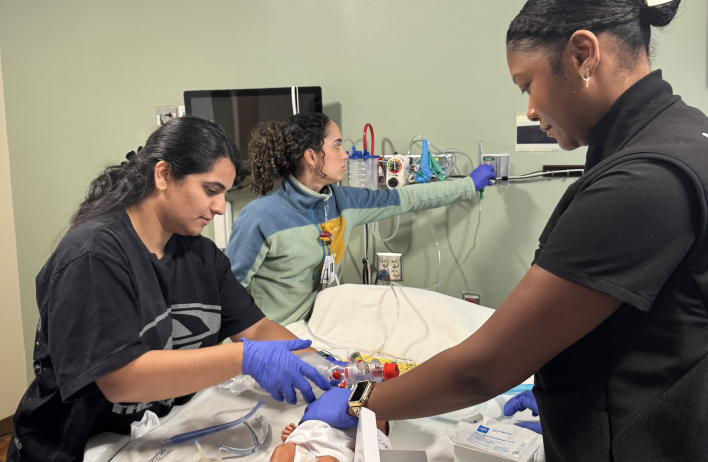 Residents performing bagged ventilation in SIM Center.