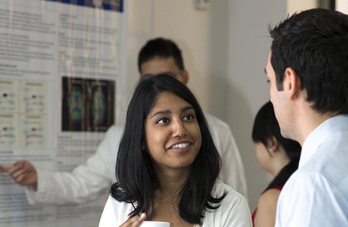residents during poster presentation