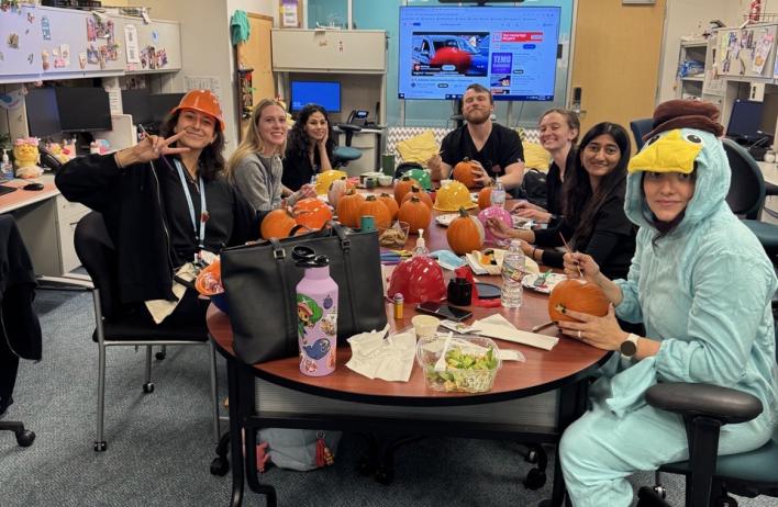 Residents carving pumpkins for Halloween