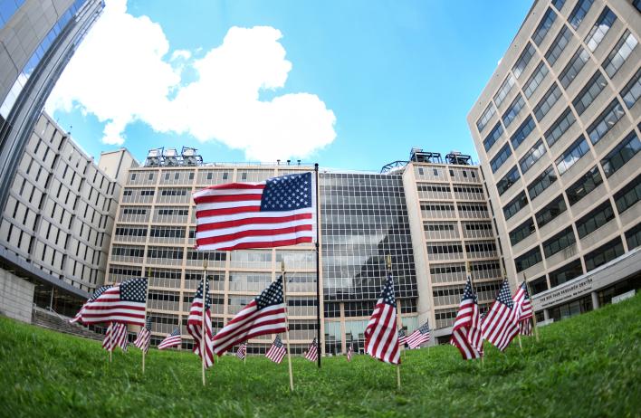BCM commemorates the 25th anniversary of September 11 by placing 25 small American flags around a larger one.