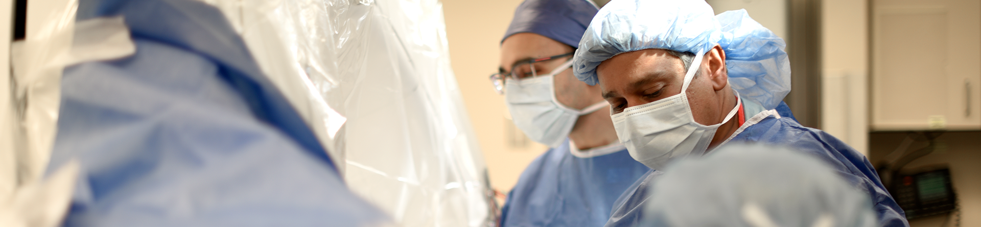 A pair of neurosurgeons in surgery