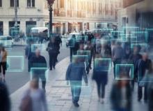 Photo of people walking on sidewalk