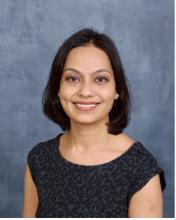 woman with short hair smiling