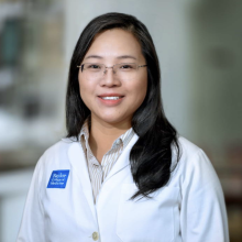 woman smiling in the lab