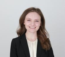 woman with medium length brown hair smiling