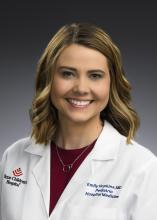 woman with medium length hair smiling