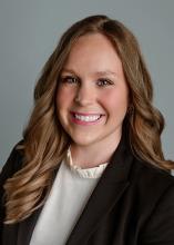 woman with long blonde hair smiling