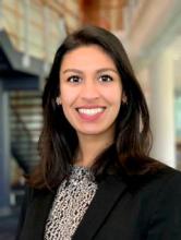 woman with brown hair smiling