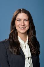 woman with wavy long hair smiling