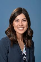 woman with shoulder length brown hair smiling