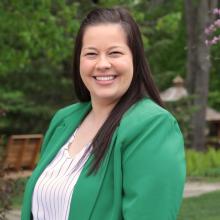 Woman smiling oustide