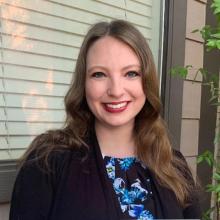 woman smiling outside