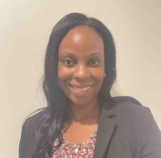 woman with long dark hair smiling
