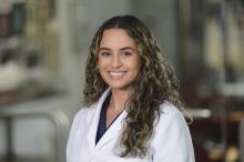 woman with highlighted brown hair smiling