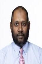 Man smiling in front of white background