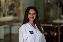 woman with long dark hair smiling