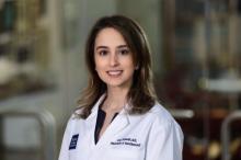 woman with shoulder length hair smiling