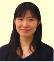 woman with bangs and long hair smiling