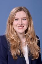 woman with long blonde hair smiling