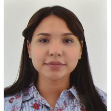 woman with long dark hair smiling lightly