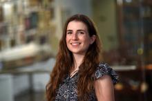 woman with long brown hair smiling