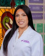woman with long dark hair smiling