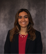 woman with long highlighted hair smiling