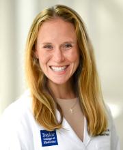 woman with long blonde hair smiling