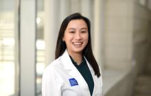 woman with straight, dark hair smiling