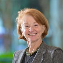 photo of woman smiling outside