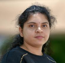 woman smiling outside