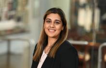 woman with shoulder-length hair smiling