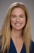 woman with long blonde hair smiling