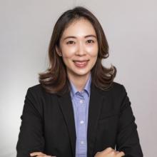 woman with medium length hair smiling