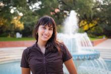 picture of person in front of a water fountain