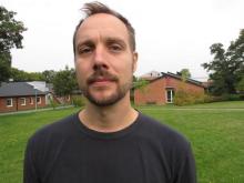 man with black tshirt on