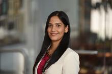 female smiling with long dark hair