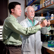 Dr. Bert O'Malley and a colleague in his lab at Baylor College of Medicine.