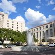 Cullen Building and fountain with the Michael E. DeBakey Center and Alkek Building in the background.